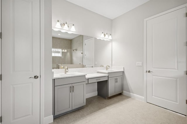 bathroom with double sink vanity and tile patterned flooring