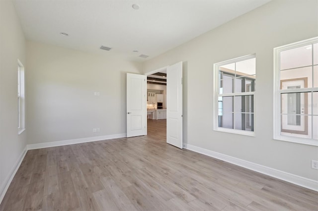 unfurnished bedroom featuring light hardwood / wood-style flooring