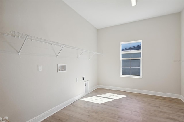 laundry room with electric dryer hookup, light hardwood / wood-style floors, and hookup for a washing machine