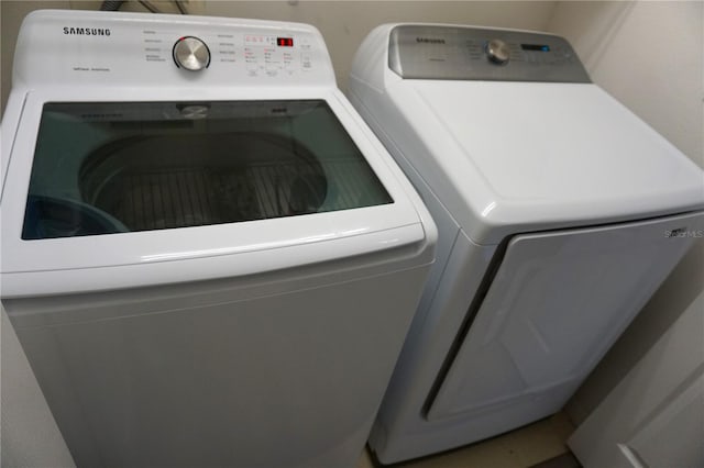 laundry room featuring washing machine and dryer