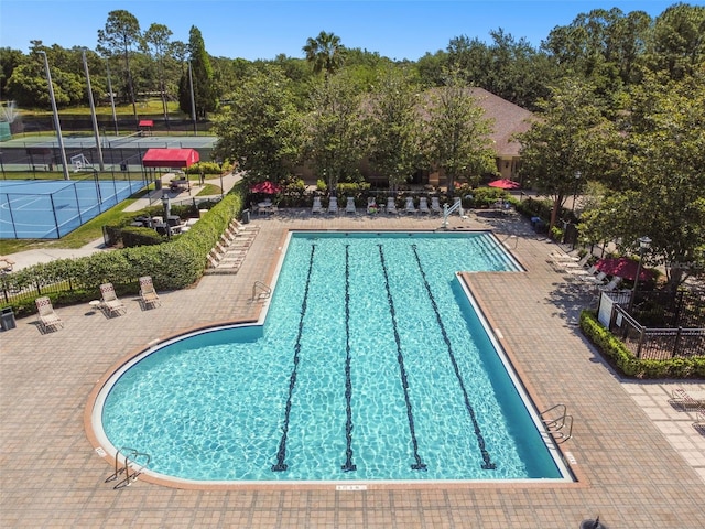 view of swimming pool featuring a patio