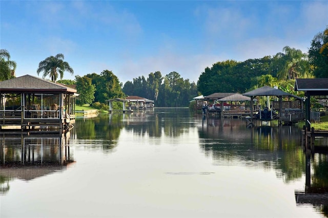 exterior space with a water view and a gazebo