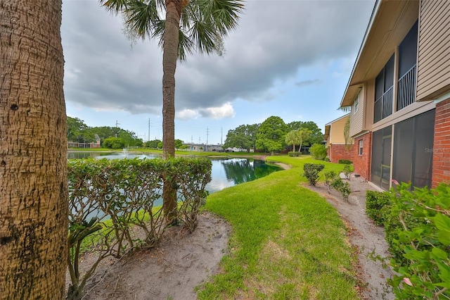 view of yard featuring a water view