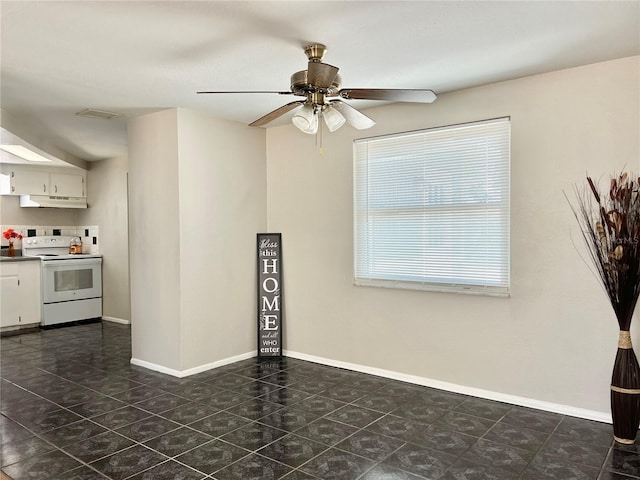 interior space featuring white cabinetry, ceiling fan, and electric stove