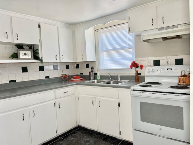 kitchen with sink, backsplash, electric range, dark tile patterned floors, and white cabinets