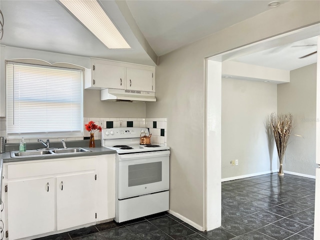 kitchen with white electric range, backsplash, sink, white cabinets, and ceiling fan