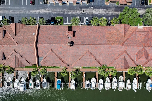 birds eye view of property featuring a water view