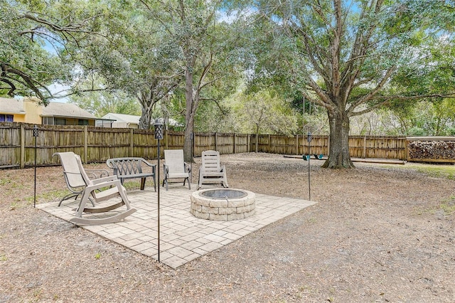 exterior space featuring a fire pit and a patio area