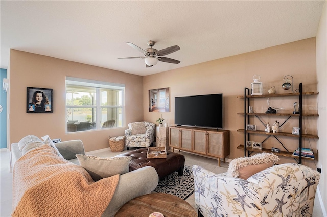 living room featuring ceiling fan