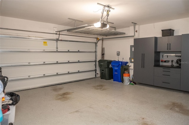 garage featuring a garage door opener