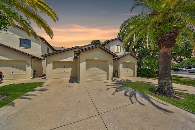 view of front of property with a garage