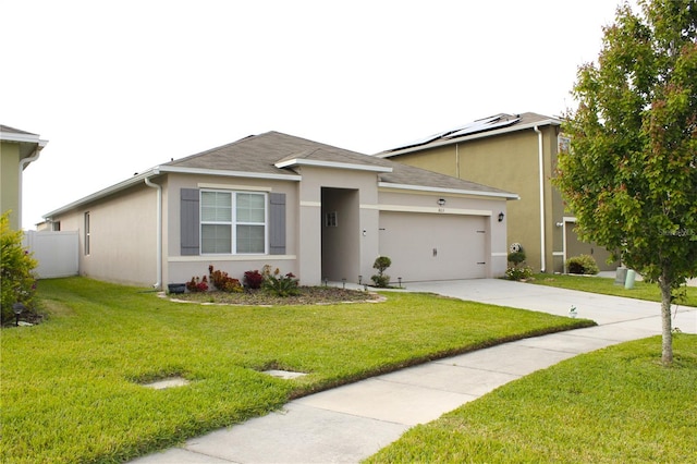 view of front facade with solar panels, a garage, and a front lawn