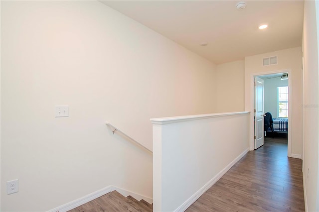 hall featuring wood-type flooring