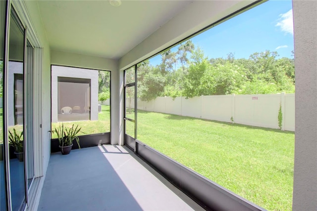 unfurnished sunroom with a healthy amount of sunlight