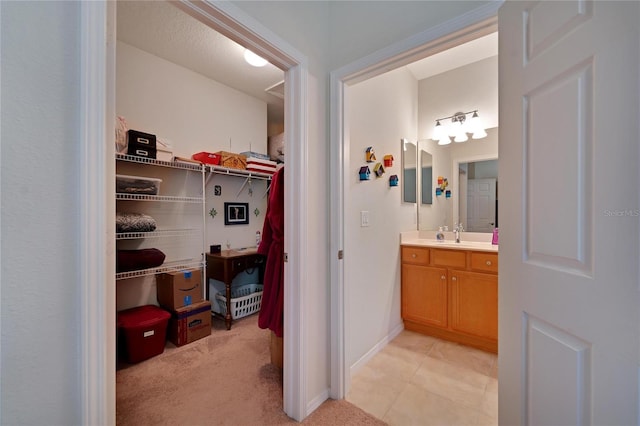 bathroom featuring tile patterned floors and vanity