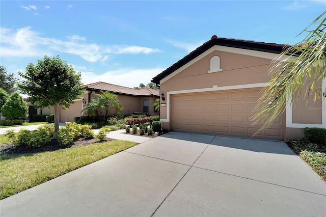 view of front of property with a garage