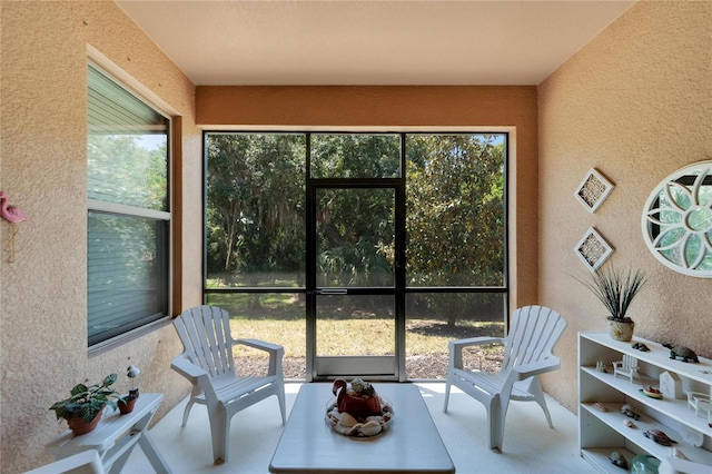 sunroom featuring a healthy amount of sunlight