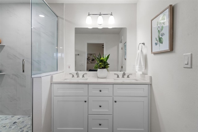 bathroom with vanity and walk in shower