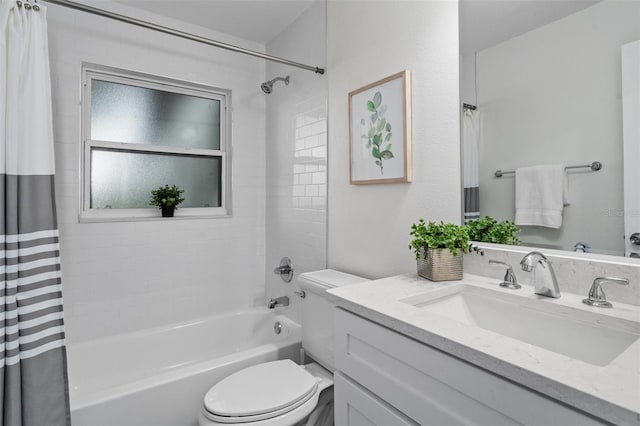 full bathroom featuring toilet, vanity, and shower / tub combo with curtain