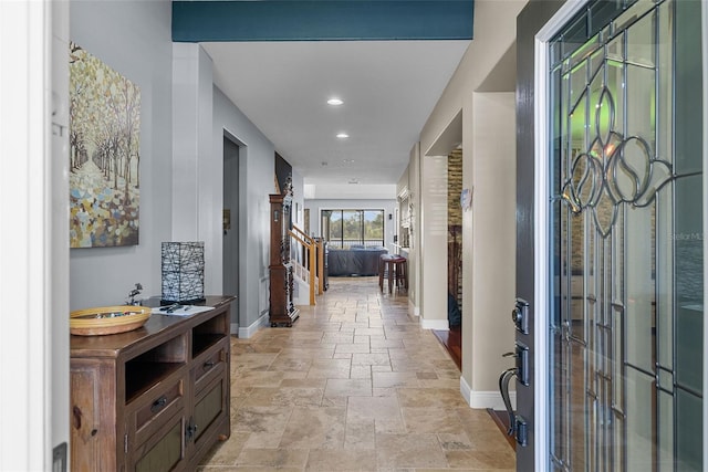 hallway with light tile patterned flooring