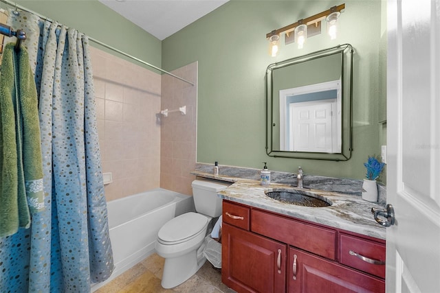 full bathroom with tile patterned flooring, shower / bath combo, toilet, and vanity