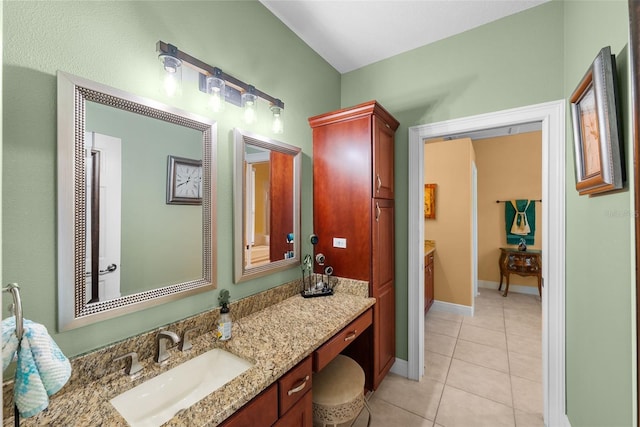 bathroom featuring vanity and tile patterned flooring