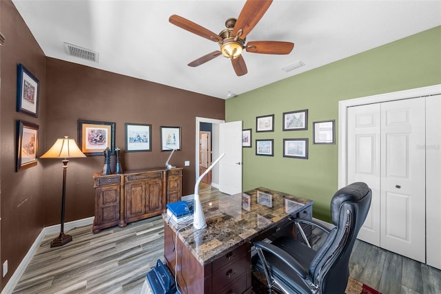 office space with ceiling fan and hardwood / wood-style floors