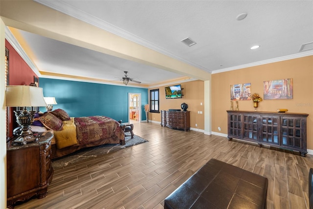 bedroom featuring hardwood / wood-style flooring, crown molding, and ceiling fan