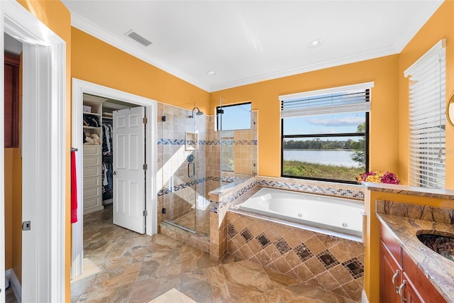 bathroom featuring a water view, tile patterned floors, separate shower and tub, vanity, and ornamental molding