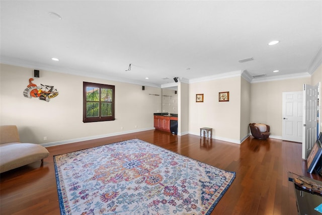 living room featuring crown molding and dark hardwood / wood-style flooring