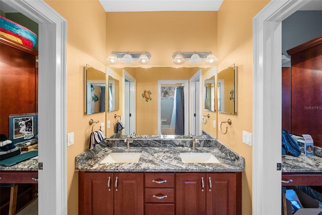 bathroom with dual vanity