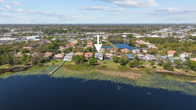 drone / aerial view with a water view