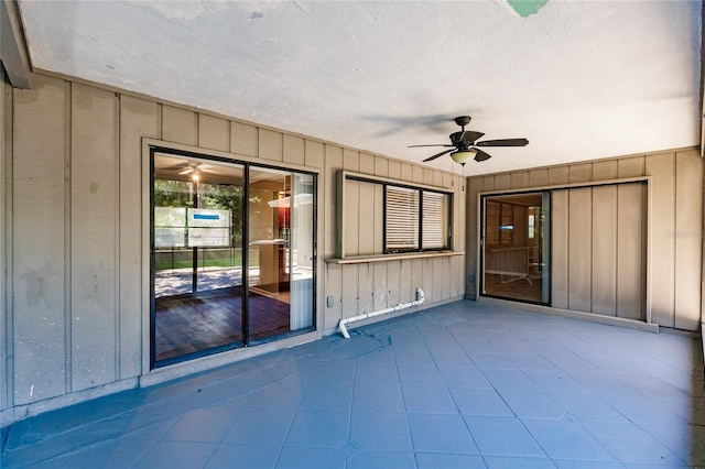 view of patio / terrace featuring ceiling fan