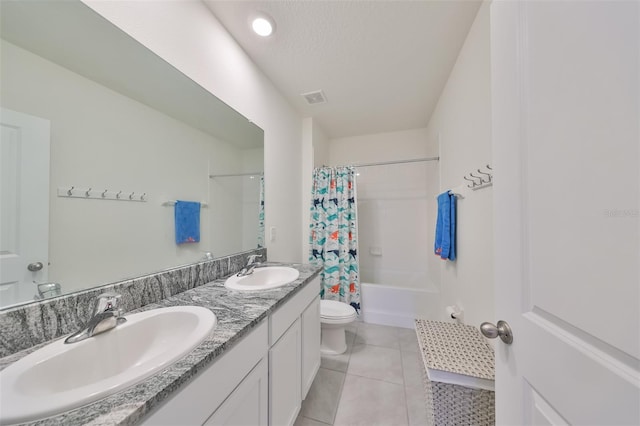 full bathroom with tile patterned floors, shower / bathtub combination with curtain, toilet, and dual bowl vanity