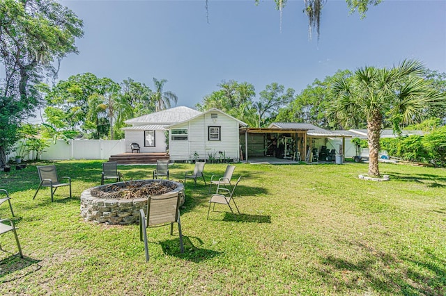 view of yard featuring a patio area and a fire pit