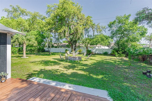 view of yard featuring a wooden deck