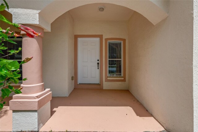 12814 Cattail Shore Ln, Riverview, FL 33579 - doorway to property with stucco siding