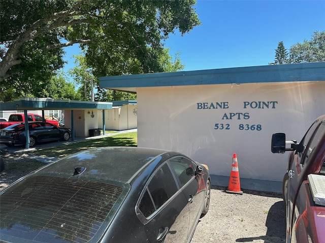 exterior space featuring a carport