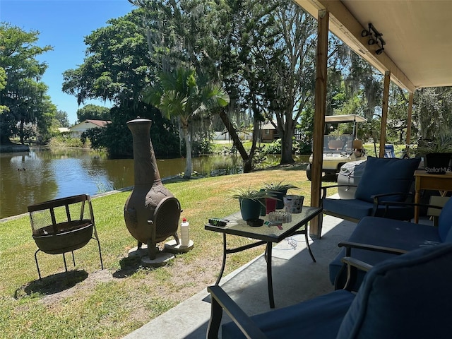 view of patio featuring a water view