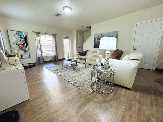 living room with hardwood / wood-style flooring