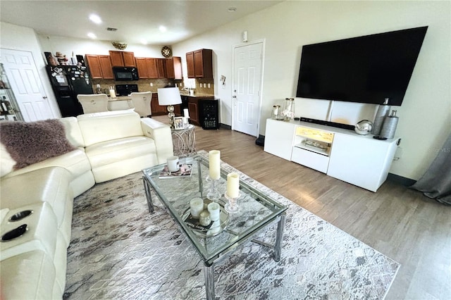 living room with wood-type flooring