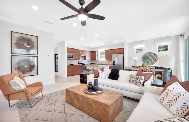 living room featuring ceiling fan