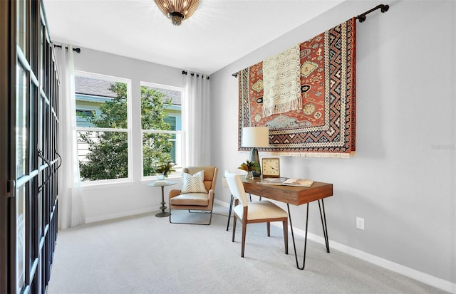 living area with carpet and a wealth of natural light