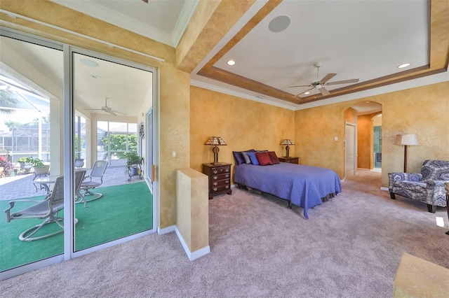 bedroom with access to outside, crown molding, arched walkways, and carpet