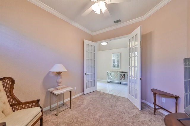 living area with visible vents, baseboards, ornamental molding, french doors, and carpet