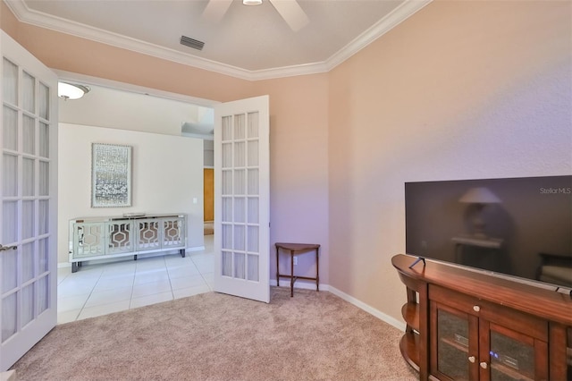 carpeted office with french doors, visible vents, crown molding, and tile patterned floors