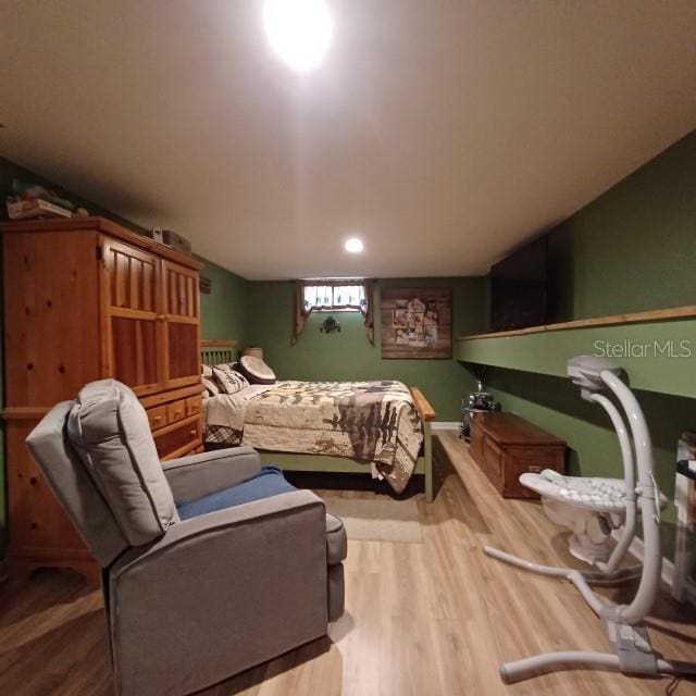 bedroom featuring hardwood / wood-style floors