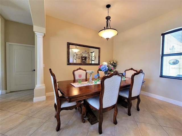 tiled dining area with ornate columns