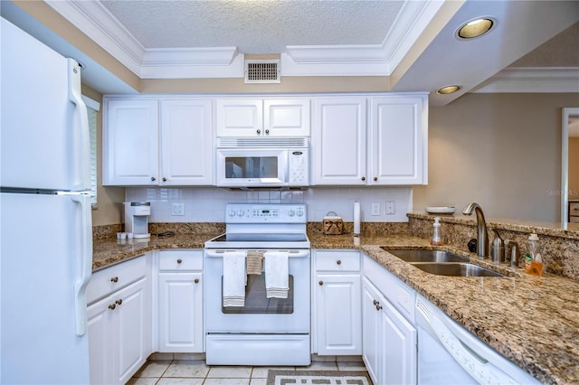 kitchen with white cabinets, white appliances, and ornamental molding