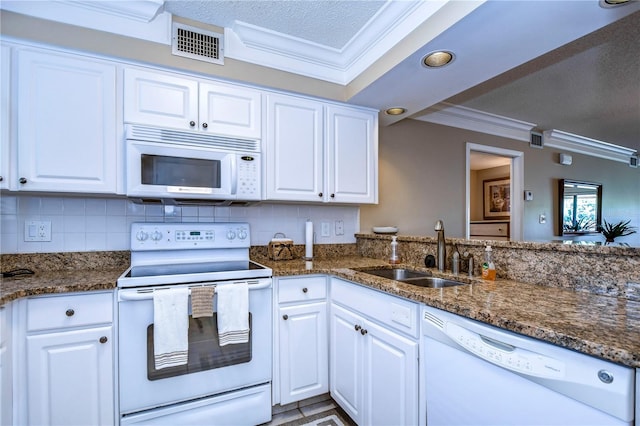 kitchen featuring crown molding, white cabinets, white appliances, and sink